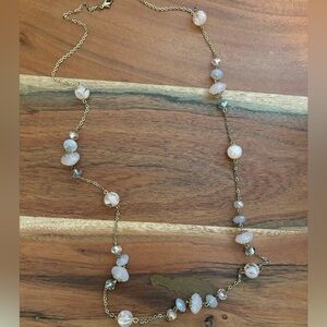Gold long necklace with pink gemstones